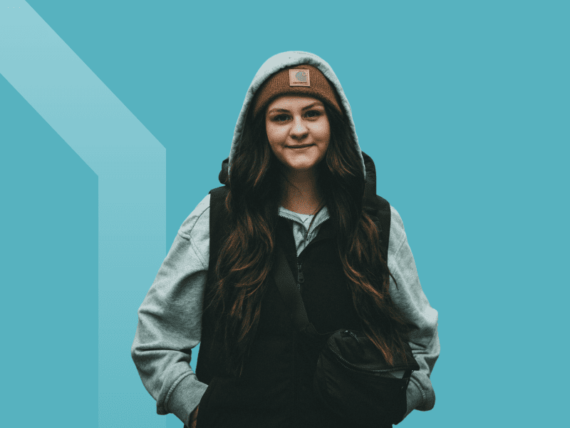 Teenage girl in hoodie at a youth homeless shelter in Denver, CO